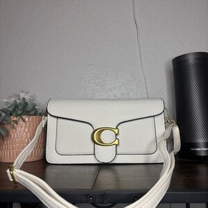 Coach White Clutch with Gold Logo